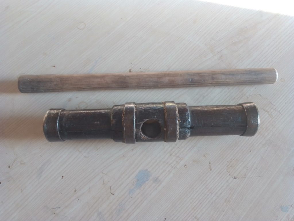 Image of a second hand caulking mallet and handle