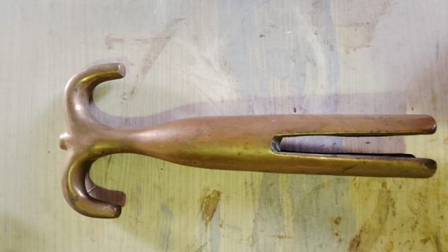 image of bronze boat hook