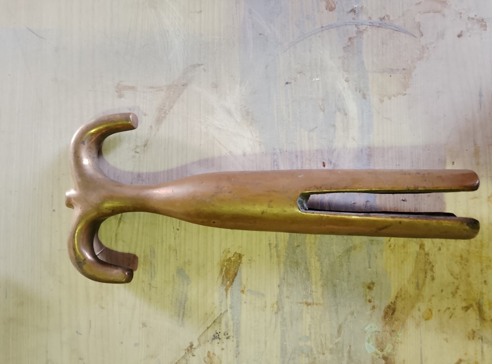 image of bronze boat hook