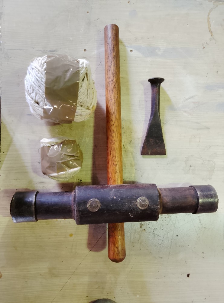 image of a second hand caulking mallet set