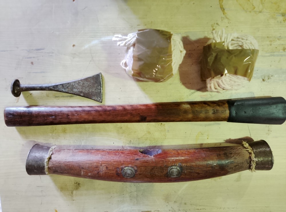 image of a second hand caulking mallet set