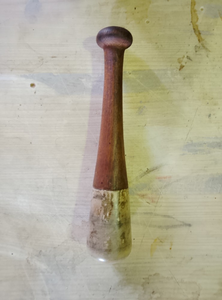 image of an antique stone head mallet
