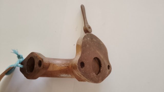 Image of a model D inlet elbow and throttle arm