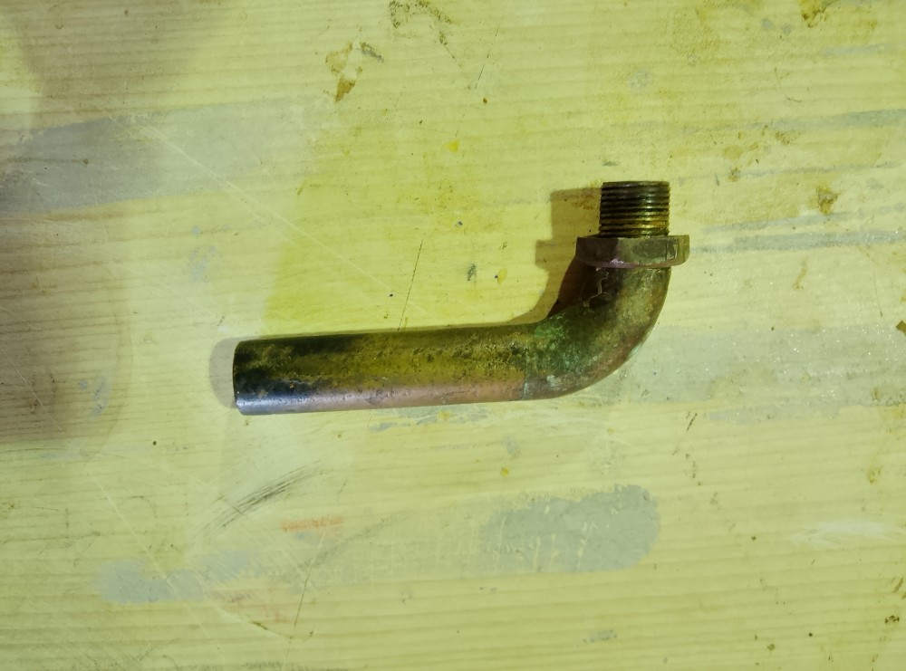 image of a second hand bronze elbow and locking nut for exhaust box