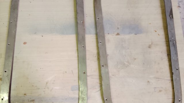 image of a pair of second hand stainless steel window surrounds