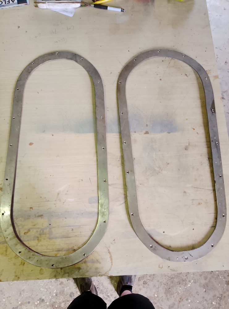 image of a pair of second hand stainless steel window surrounds