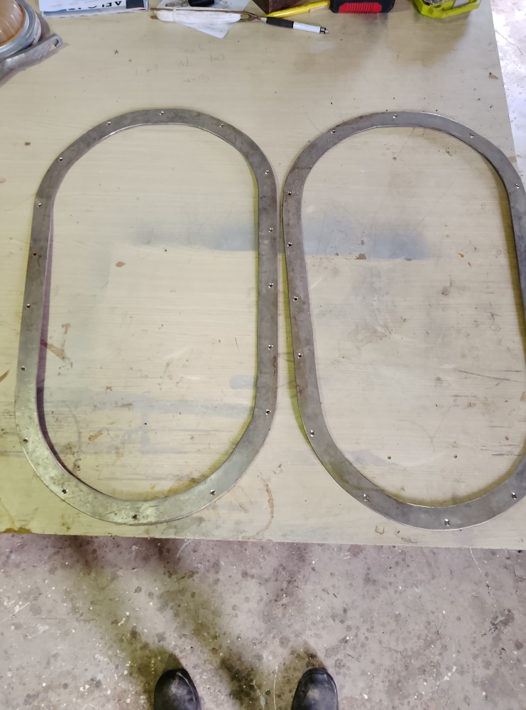 image of a pair of second hand stainless steel window surrounds