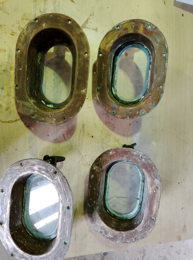 Image of a set of 4 bronze oval port holes